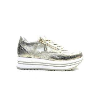 sneakers de piel en color dorado,con plataforma y cremallera lateral,marca nero giardini