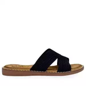 Sandalia de la marca Exe, modelo ZF1982 en color negro. Sandalias plana confeccionada en materiales sintéticos con pala en cuerda trenzada color negro metalizado. Detalle de tachuelas bordeando la planta.