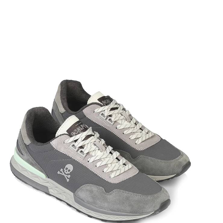 Zapatillas de la marca Scalpers modelo Harry en color gris. Zapatillas deportivas elaboradas en nylon y ante con detalle de calavera. Forro en malla. Suela de EVA y TPR con detalle. Estabilizador a tono.